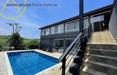 Imagem: A casa possui 3 Dormitórios, 3 Suítes, 4 Banheiros, 3 Vagas