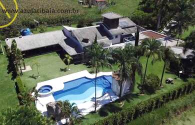 Imagem: A chácara possui 5 Dormitórios, 5 Suítes, 6 Banheiros, 5