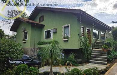 Imagem: A chácara possui 3 Dormitórios, 3 Suítes, 5 Banheiros, 4