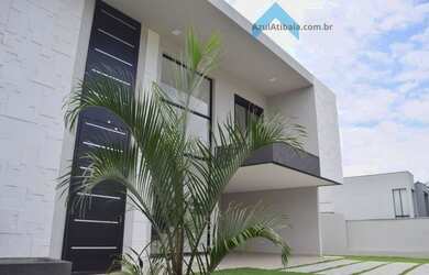 Imagem: A casa em condomínio possui 4 Dormitórios, 4 Suítes, 5 Banheiros