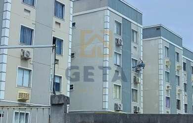 Imagem: O apartamento possui 2 Dormitórios, 1 Banheiro, 1 Vaga na garagem