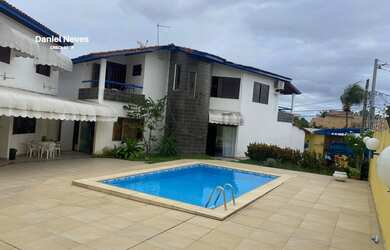 Imagem: A casa possui 5 Dormitórios, 5 Suítes, 7 Banheiros, 5 Vagas