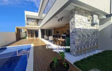 Imagem: A casa em condomínio possui 5 Dormitórios, 5 Suítes, 7 Banheiros