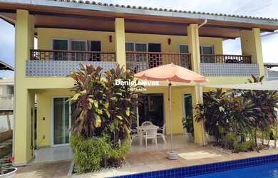 Imagem: A casa possui 5 Dormitórios, 4 Suítes, 6 Banheiros, 5 Vagas