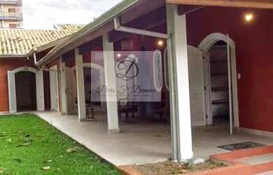 Imagem: A casa possui 4 Dormitórios, 4 Suítes, 2 Vagas na garagem