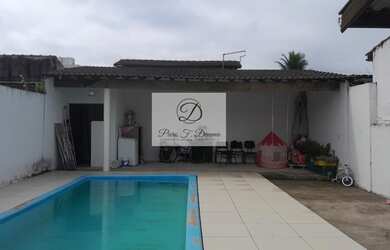 Imagem: A casa possui 2 Dormitórios, 1 Suíte, 2 Banheiros, 2 Vagas