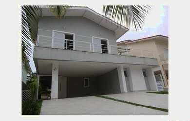 Imagem: A casa possui 4 Dormitórios, 4 Suítes, 5 Banheiros, 4 Vagas