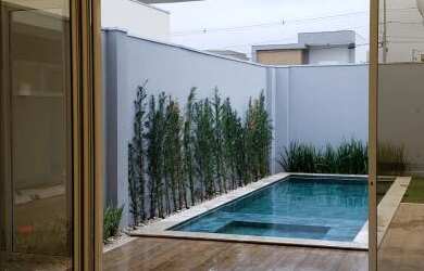 Imagem: A casa em condomínio possui 4 Dormitórios, 4 Suítes, 5 Banheiros