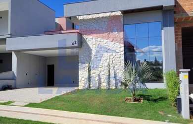 Imagem: A casa em condomínio possui 3 Dormitórios, 3 Suítes, 4 Banheiros