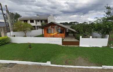 Imagem: A casa possui 2 Dormitórios, 1 Banheiro, 2 Vagas na garagem