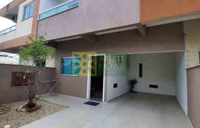 Imagem: A casa possui 3 Dormitórios, 1 Suíte, 2 Banheiros, 2 Vagas