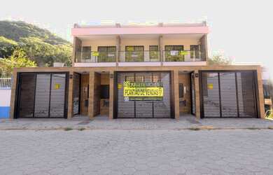 Imagem: A casa possui 2 Dormitórios, 2 Suítes, 3 Banheiros, 1 Vaga