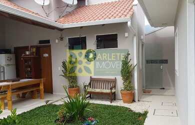 Imagem: A casa possui 3 Dormitórios, 1 Suíte, 3 Banheiros, 2 Vagas