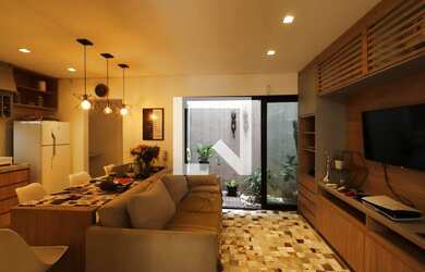 Imagem: A casa possui 4 Dormitórios, 4 Banheiros, 2 Vagas na garagem