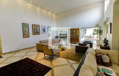 Imagem: A casa possui 7 Dormitórios, 5 Suítes, 7 Banheiros, 5 Vagas