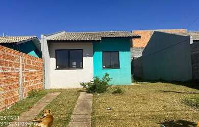 Imagem: O terreno possui 2 Dormitórios, 1 Banheiro, 1 Vaga na garagem