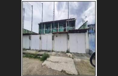 Imagem: A casa possui 2 Dormitórios, 1 Banheiro, 1 Vaga na garagem