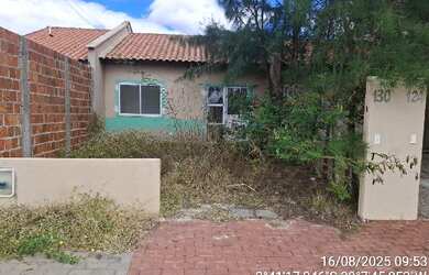 Imagem: A casa possui 2 Dormitórios, 1 Banheiro, 1 Vaga na garagem