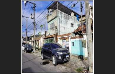Imagem: A casa possui 3 Dormitórios, 1 Banheiro, 1 Vaga na garagem