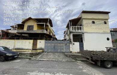 Imagem: A casa possui 3 Dormitórios, 1 Banheiro, 1 Vaga na garagem