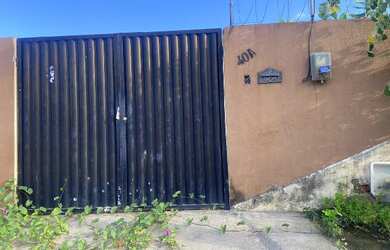 Imagem: A casa possui 2 Dormitórios, 1 Banheiro, 1 Vaga na garagem