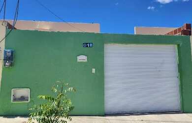 Imagem: A casa possui 2 Dormitórios, 1 Banheiro, 1 Vaga na garagem