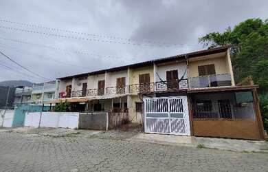 Imagem: A casa possui 2 Dormitórios, 1 Banheiro, 1 Vaga na garagem