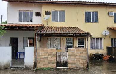 Imagem: A casa possui 2 Dormitórios, 1 Banheiro, 1 Vaga na garagem