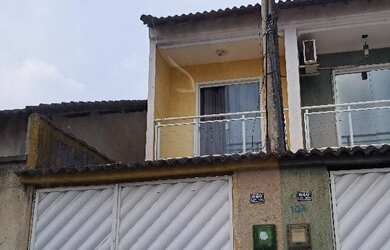 Imagem: A casa possui 2 Dormitórios, 1 Banheiro, 1 Vaga na garagem