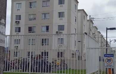 Imagem: O apartamento possui 2 Dormitórios, 1 Banheiro, 1 Vaga na garagem