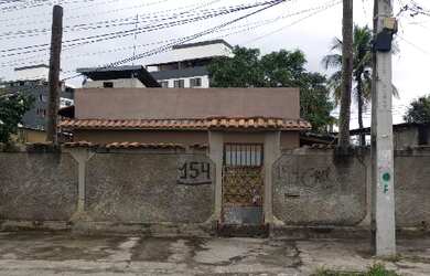 Imagem: A casa possui 2 Dormitórios, 1 Banheiro, 2 Vagas na garagem
