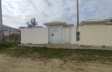 Imagem: A casa possui 2 Dormitórios, 1 Banheiro, 1 Vaga na garagem