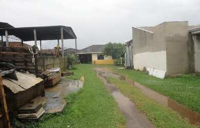 Imagem: A casa possui 2 Dormitórios, 1 Banheiro, 1 Vaga na garagem
