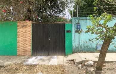 Imagem: A casa possui 2 Dormitórios, 1 Banheiro, 2 Vagas na garagem