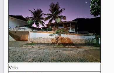 Imagem: A casa possui 3 Dormitórios, 1 Banheiro, 2 Vagas na garagem