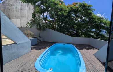 Imagem 13: Casa com 5 dormitórios sendo 3 suítes e 4 vagas de garagem em Florianópolis/SC