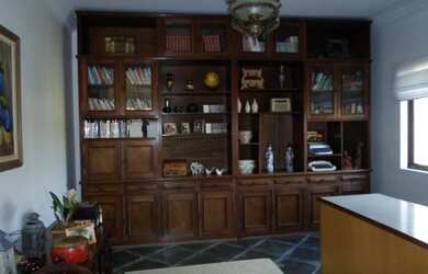 Imagem: A casa possui 3 Dormitórios, 5 Banheiros, 5 Vagas na garagem