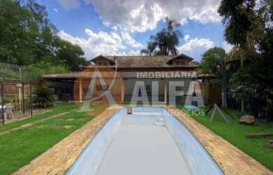 Imagem: A chácara possui 4 Dormitórios, 3 Suítes, 5 Banheiros, 4