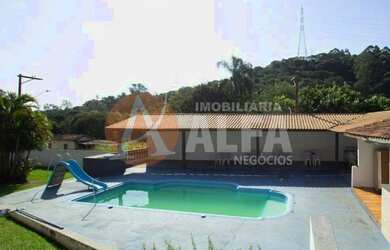 Imagem: A chácara possui 3 Dormitórios, 1 Suíte, 5 Banheiros, 6 Vagas