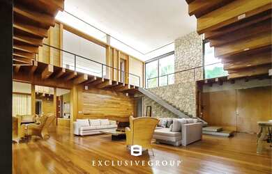 Imagem: A casa possui 5 Dormitórios, 5 Suítes, 8 Banheiros, 6 Vagas