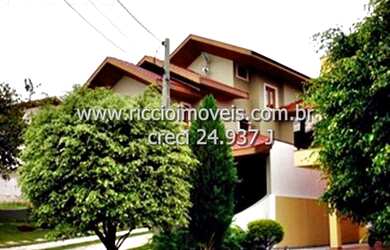 Imagem: A casa em condomínio possui 4 Dormitórios, 4 Suítes, 7 Banheiros