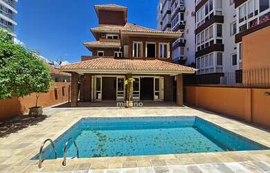 Imagem: A loja possui 5 Dormitórios, 1 Suíte, 4 Banheiros, 5 Vagas