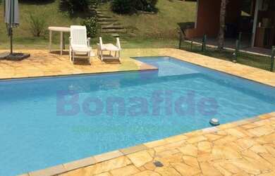 Imagem: A chácara possui 4 Dormitórios, 4 Suítes, 5 Banheiros, 7