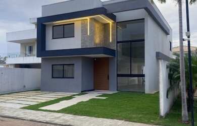 Imagem: A casa possui 4 Dormitórios, 4 Suítes, 7 Banheiros, 2 Vagas