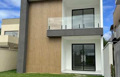 Imagem: A casa possui 4 Dormitórios, 2 Suítes, 3 Banheiros, 2 Vagas