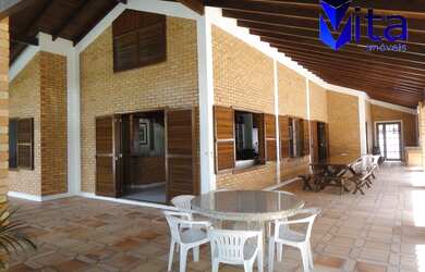 Imagem: A casa possui 4 Dormitórios, 3 Suítes, 4 Banheiros, 4 Vagas