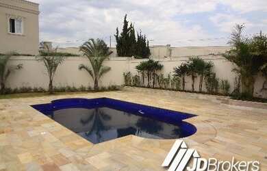 Imagem: A casa em condomínio possui 4 Dormitórios, 4 Suítes, 2 Banheiros