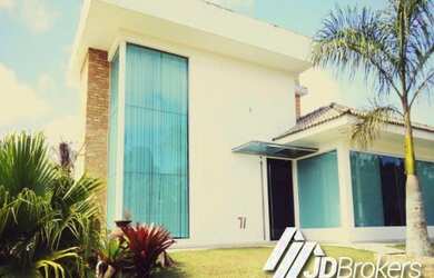 Imagem: A casa em condomínio possui 4 Dormitórios, 4 Suítes, 7 Banheiros