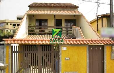 Imagem: A casa possui 4 Dormitórios, 3 Banheiros, 132m² de Área Privada