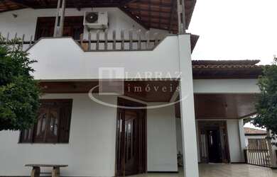 Imagem: A casa possui 4 Dormitórios, 2 Suítes, 8 Banheiros, 15 Vagas